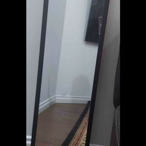 Black standing mirror